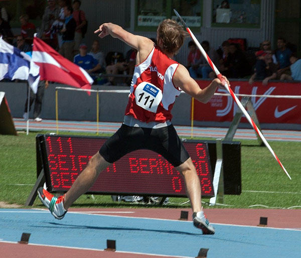 A man is throwing a javelin