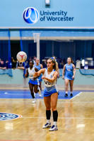 University of Worcester netball player catching a netball in a game