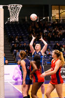 University of Worcester netball player about to score a goal in a game