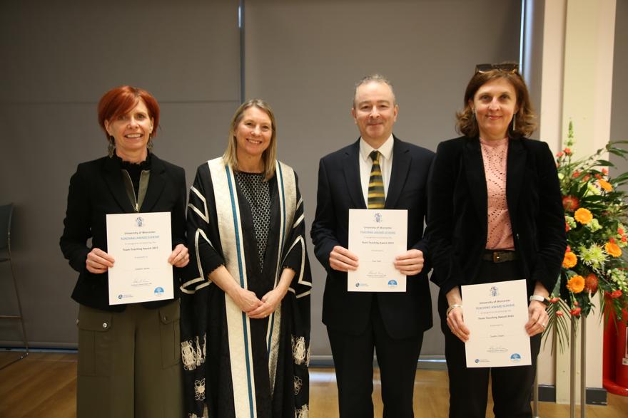 Three members of University staff hold certificates, alongside the University Provost