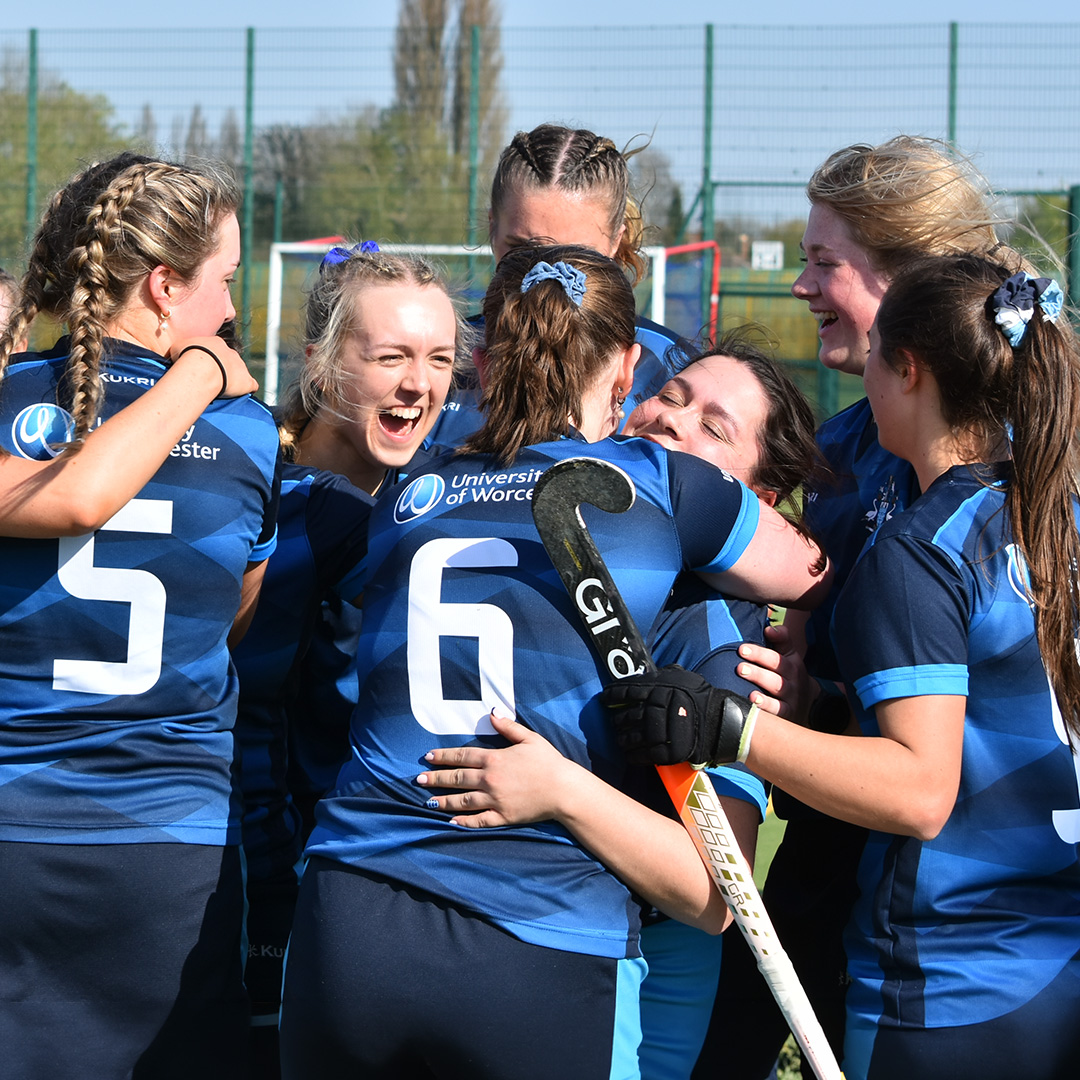 students playing hockey