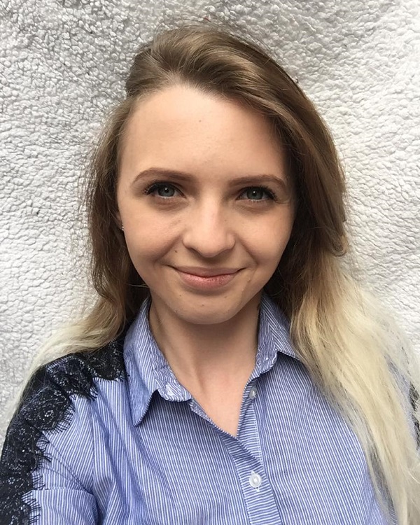 University of Worcester logo on a light blue background