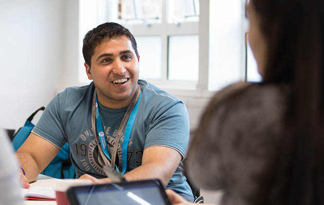 Medical student smiling while in lecture