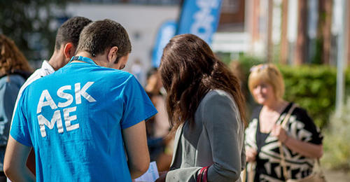 A student helps Open Day attendees