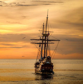A sailing boat on a calm sea