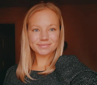 University of Worcester logo on a light blue background