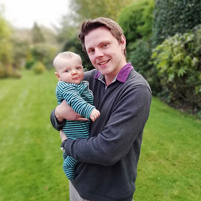 Man holding a baby