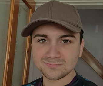 University of Worcester logo on a light blue background