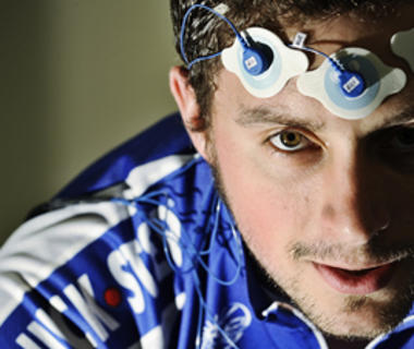 Sportsman with monitoring devises on his forehead