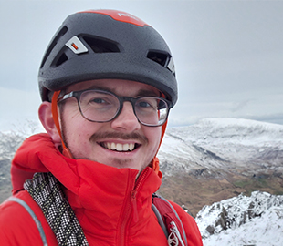 a man hiking in outdoor gear