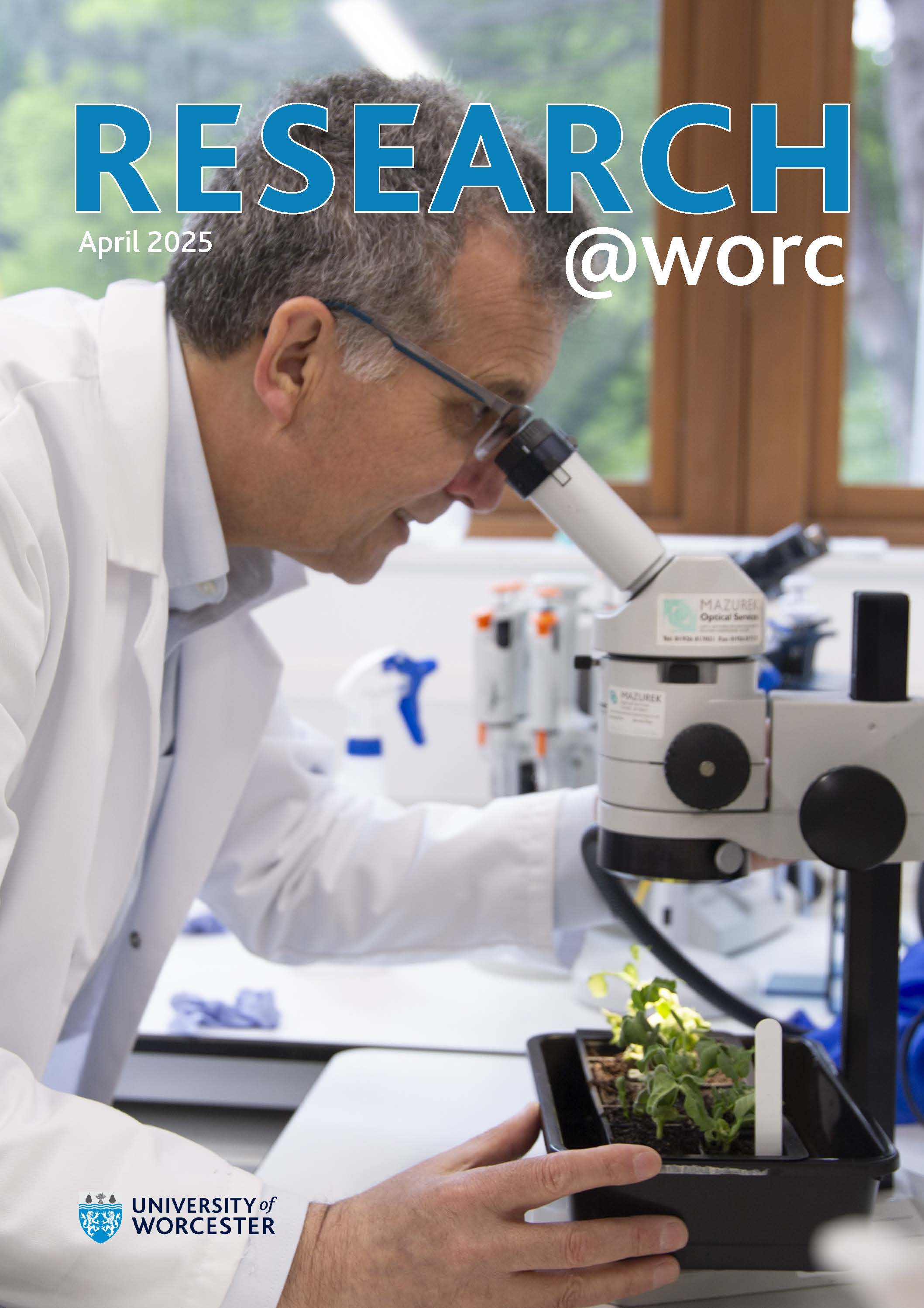 Academic examining flowers under a microscope 