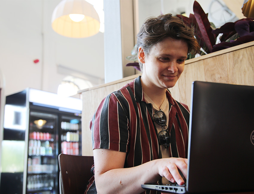 Student studying in a cafe