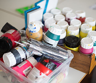 a cluster of paint pots